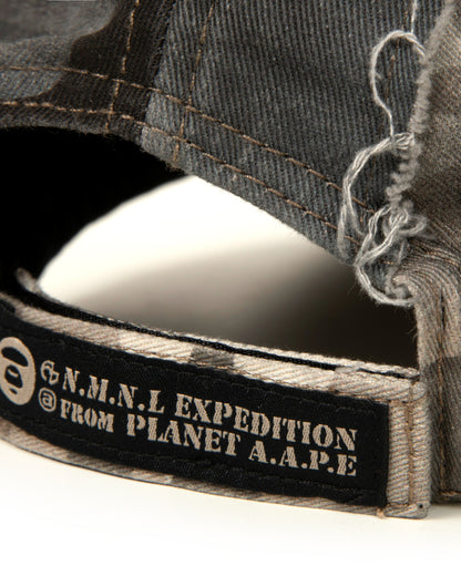 X NOMANUAL Moonface Crossover Cap