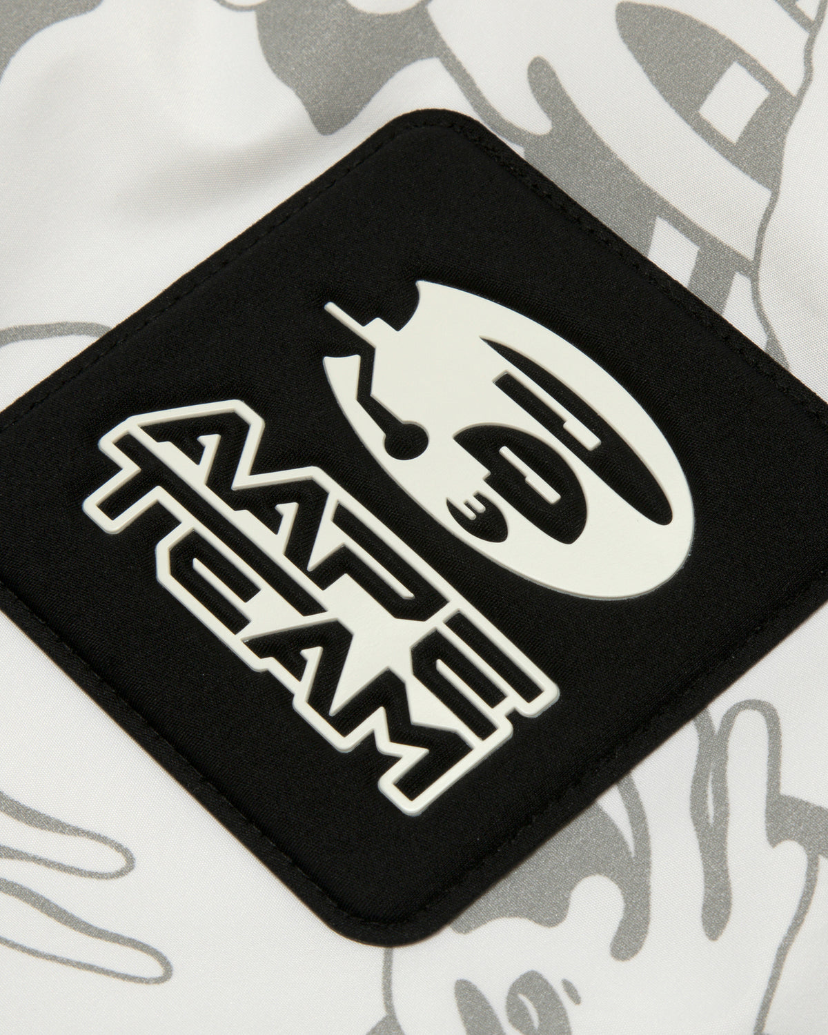 Moonface camo hooded down jacket