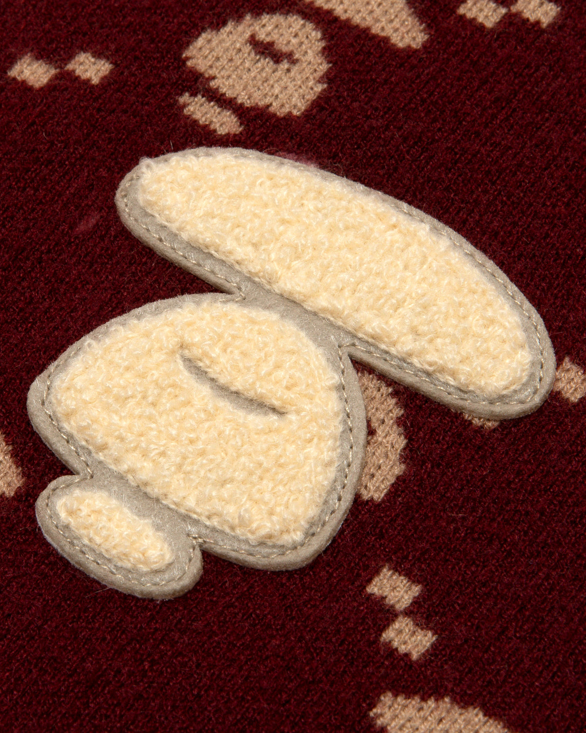 Moonface intarsia patterned jumper