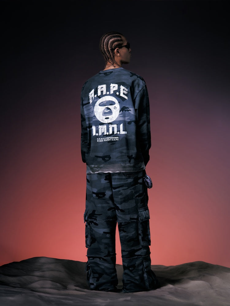 X NOMANUAL Moonface Camo Cargo Sweat Pants