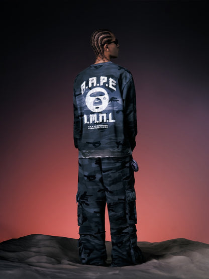 X NOMANUAL Moonface Camo Cargo Sweat Pants