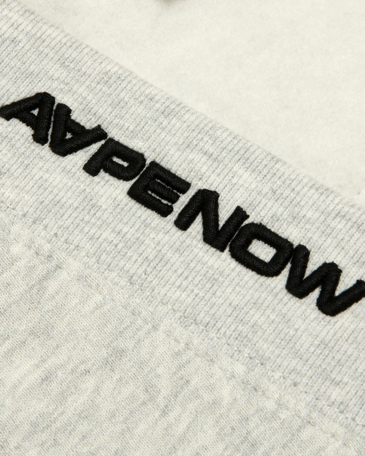 AAPE NOW moonface logo button down cardigan